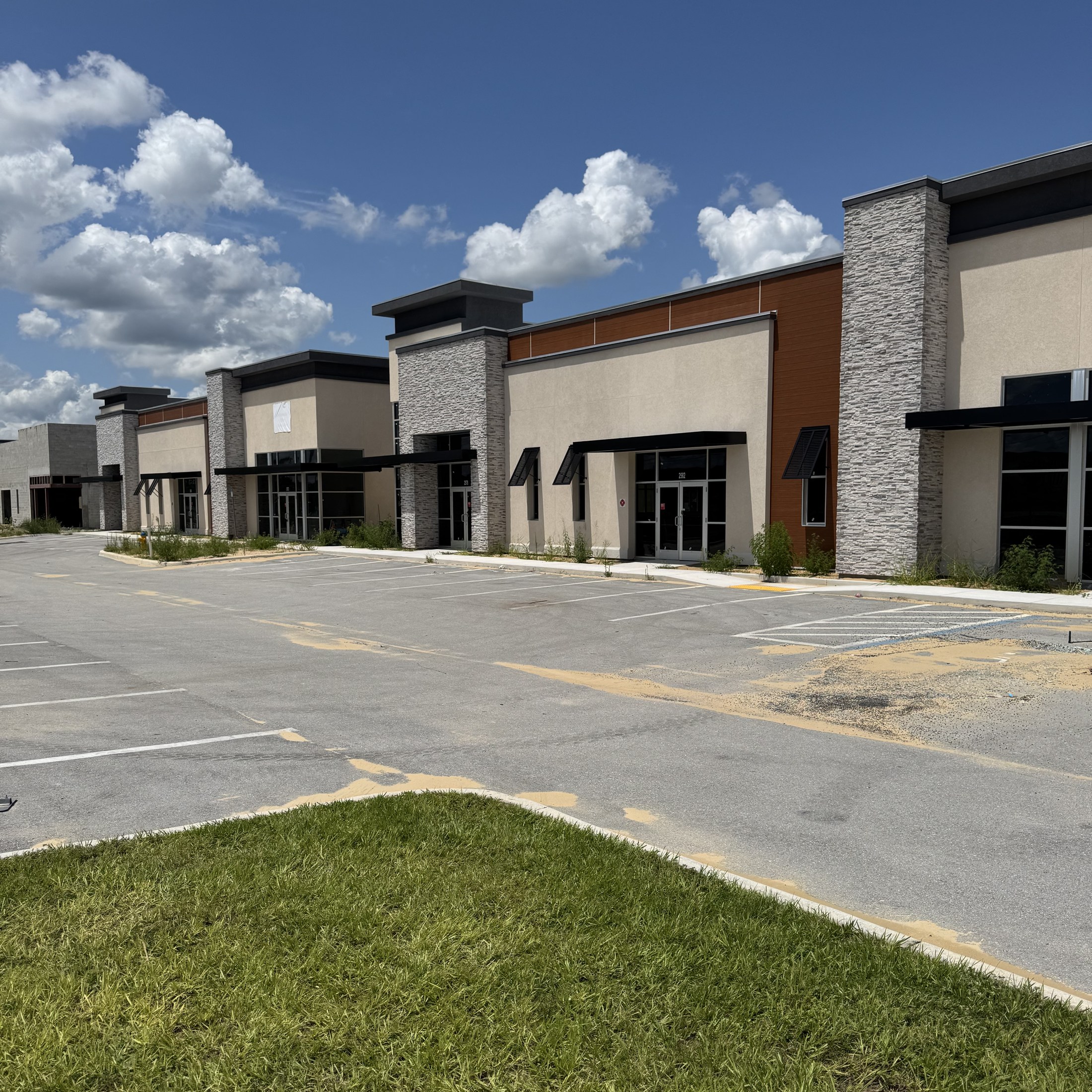 Completed multi-tenant strip mall exterior